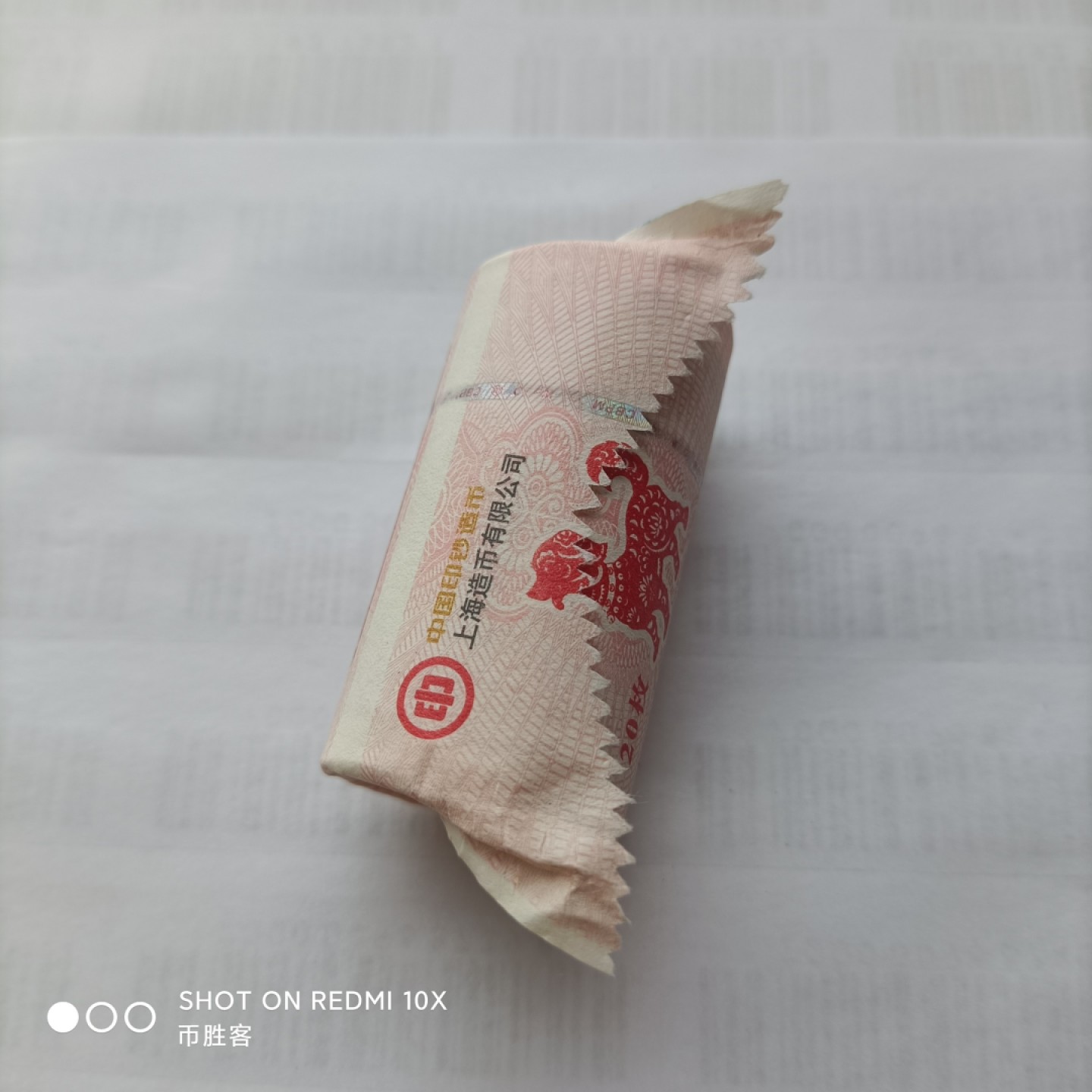 搬家总是有惊喜
找到了三卷狗年纪念币，有一卷两头都是面值，正好拆了，😂
