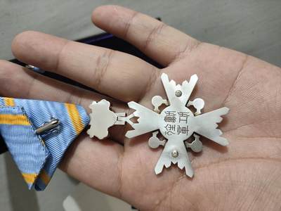 荣改后的瑞宝双光章