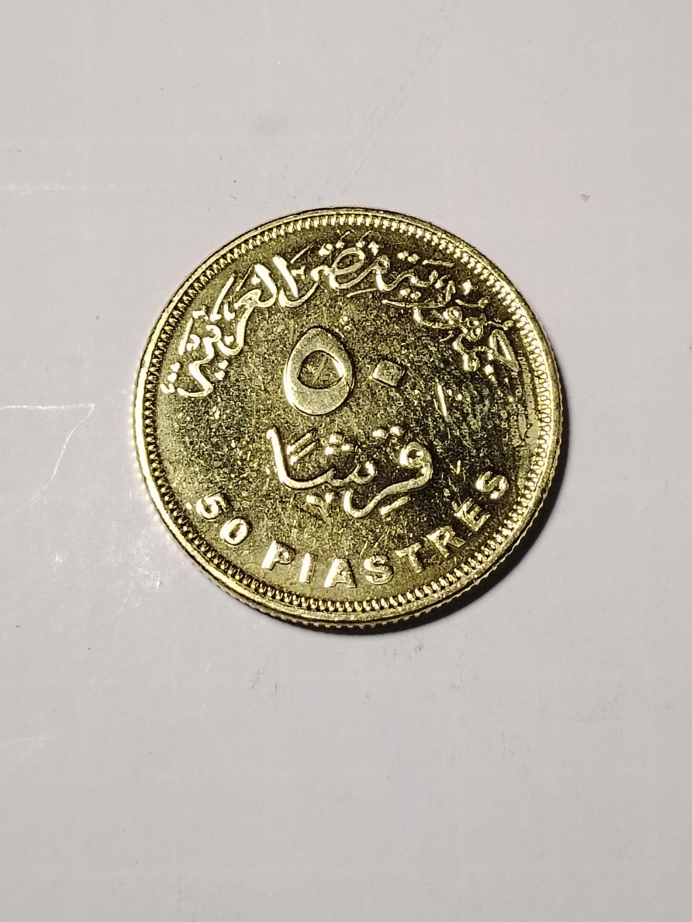 个人觉得还是老硬币好。