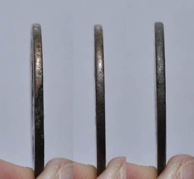 乾元重宝折十，背瑞雀。