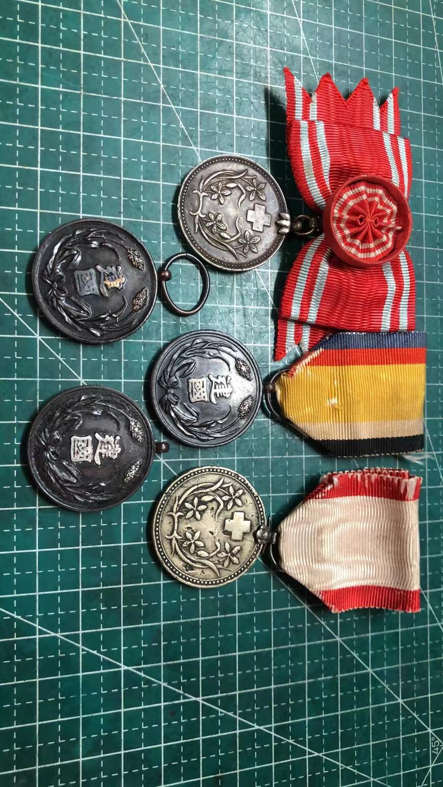 日章伪满章 和无锡汉奸章复制品