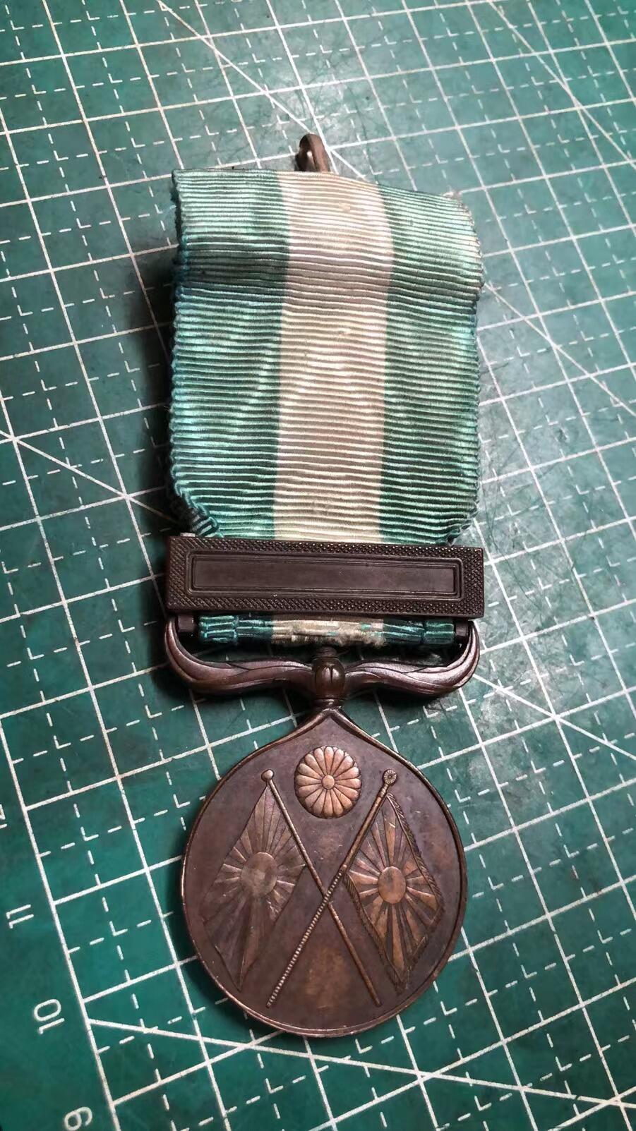 日章伪满章 和无锡汉奸章复制品