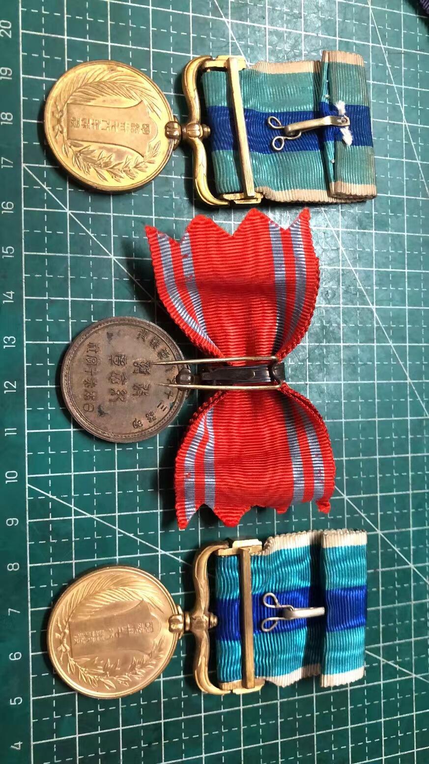 日章伪满章 和无锡汉奸章复制品