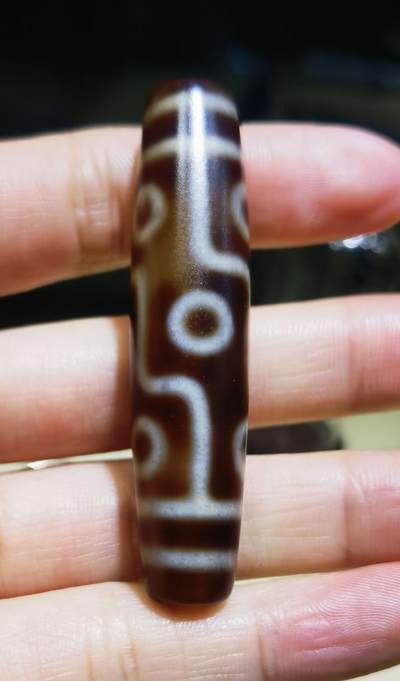 旧藏九眼天珠项链吊坠挂件锁骨链男女款。熟珠，已玉化包浆！尺寸:5.8cm*1.3cm