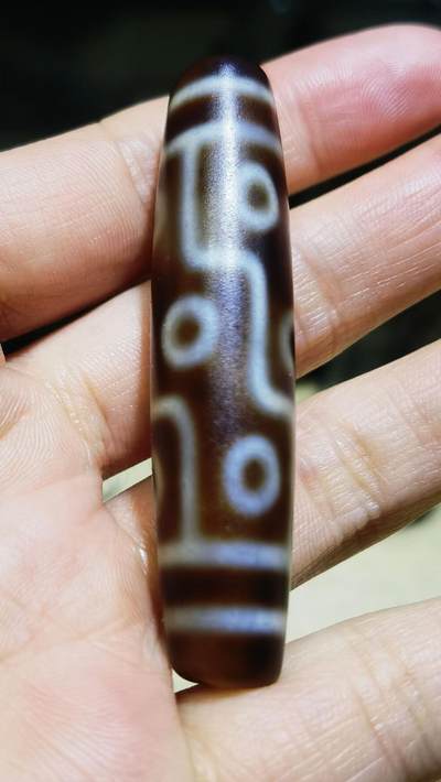 旧藏九眼天珠项链吊坠挂件锁骨链男女款。熟珠，已玉化包浆！尺寸:5.8cm*1.3cm