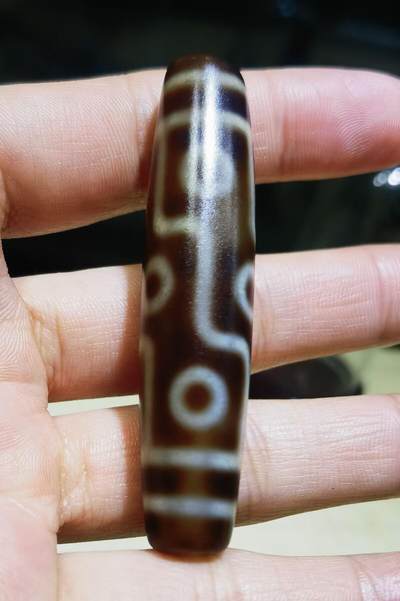 旧藏九眼天珠项链吊坠挂件锁骨链男女款。熟珠，已玉化包浆！尺寸:5.8cm*1.3cm
