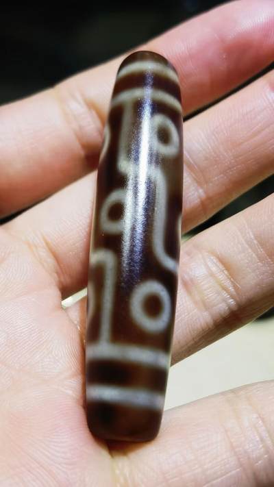 旧藏九眼天珠项链吊坠挂件锁骨链男女款。熟珠，已玉化包浆！尺寸:5.8cm*1.3cm