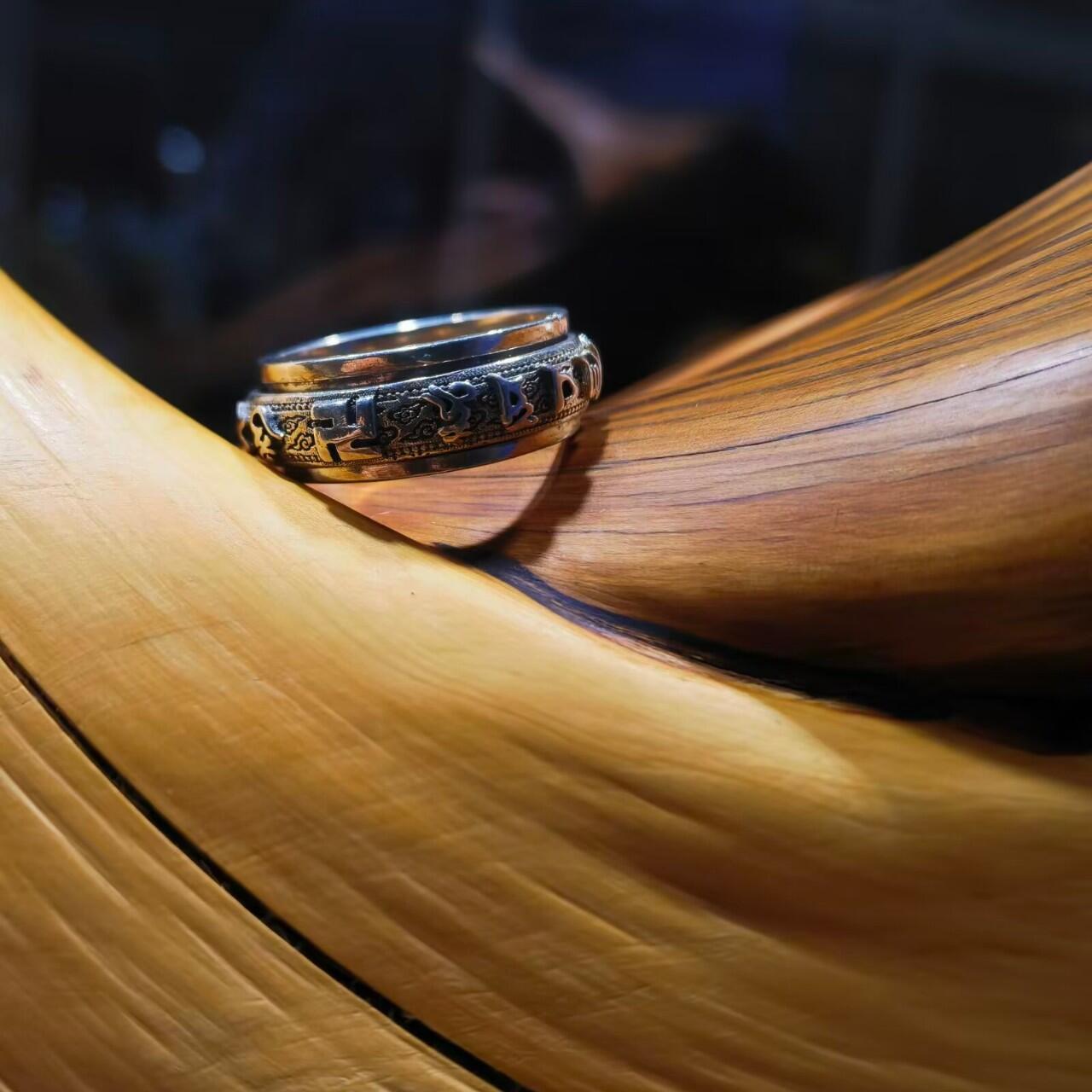 925银指圈戒指女款，外圈可转动，雕刻六字真言降魔铃等，内径16。