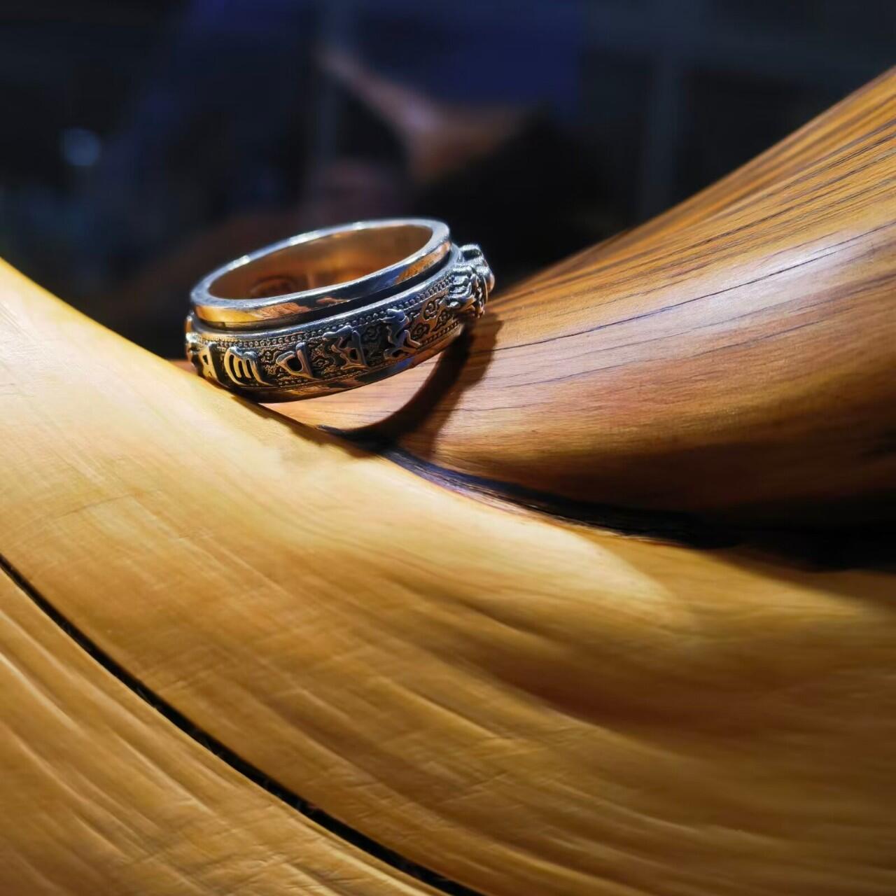 925银指圈戒指女款，外圈可转动，雕刻六字真言降魔铃等，内径16。