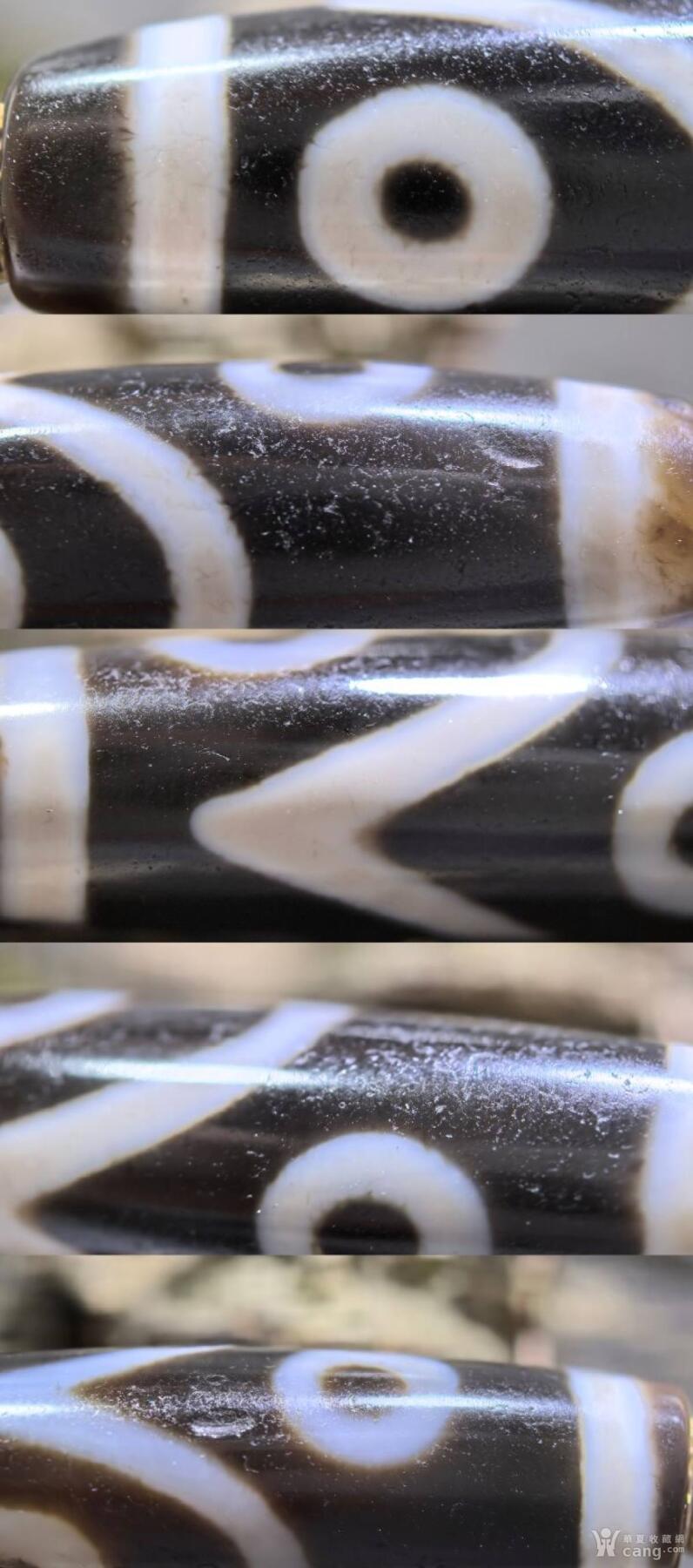 聚源四眼天珠项链锁骨链吊坠挂件男女款，咬线分明，黑白线条有明显的分界线，胎脂比较油润，此款四眼天珠属于特殊图腾的四眼天珠。市面比较少见，纯手工珠。