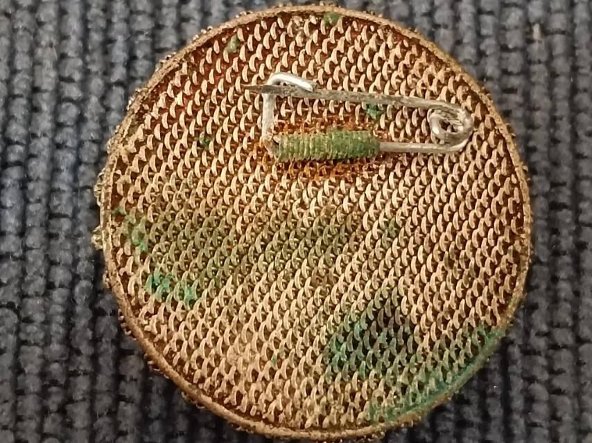 早期掐丝毛主席像章