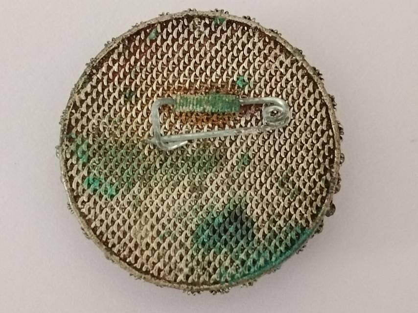 早期掐丝毛主席像章