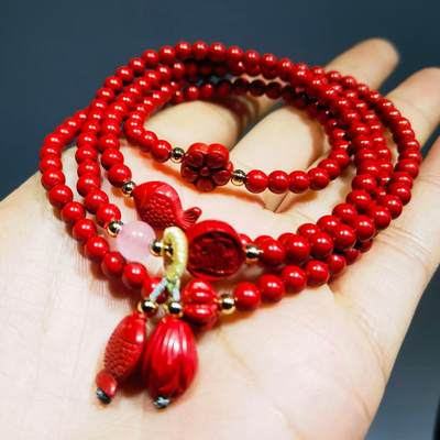 超高含量朱砂原矿帝王砂佛珠手串女款颗颗精选原矿帝王砂0.4cm红砂搭配年年有余、招财进宝平安扣，莲花等配饰，隔珠为14K金！可绕手腕四圈！清新素雅温婉简约！
克重：29.3
