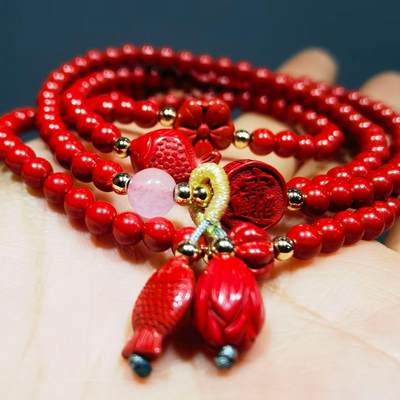 超高含量朱砂原矿帝王砂佛珠手串女款颗颗精选原矿帝王砂0.4cm红砂搭配年年有余、招财进宝平安扣，莲花等配饰，隔珠为14K金！可绕手腕四圈！清新素雅温婉简约！
克重：29.3
