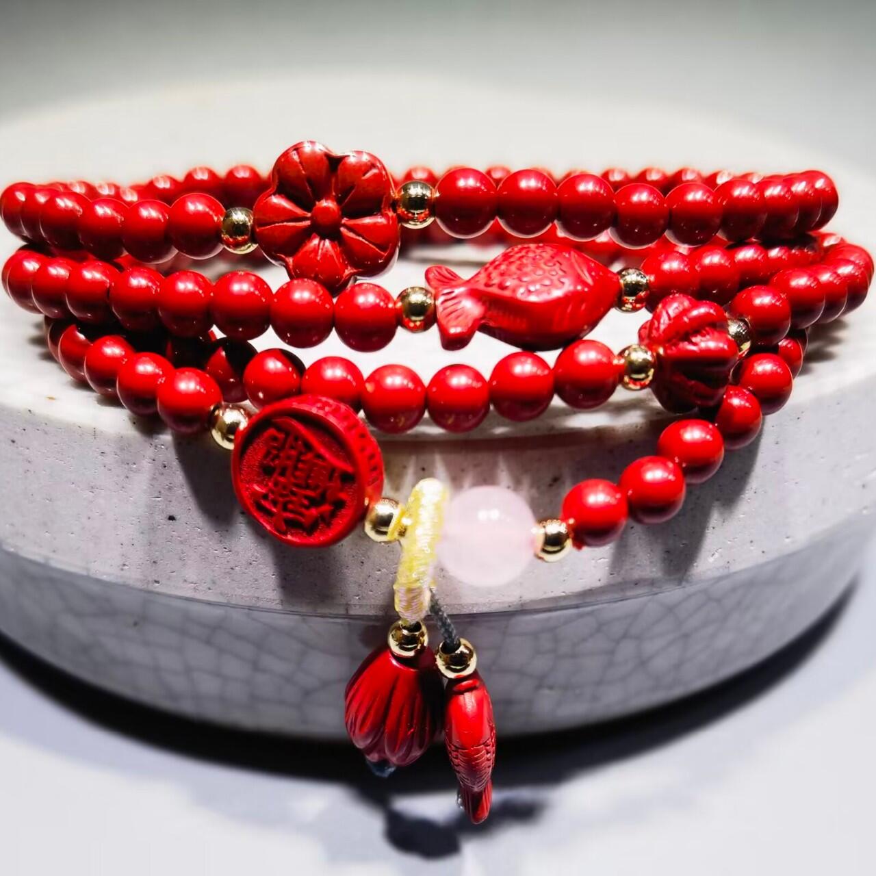超高含量朱砂原矿帝王砂佛珠手串女款颗颗精选原矿帝王砂0.4cm红砂搭配年年有余、招财进宝平安扣，莲花等配饰，隔珠为14K金！可绕手腕四圈！清新素雅温婉简约！
克重：29.3
