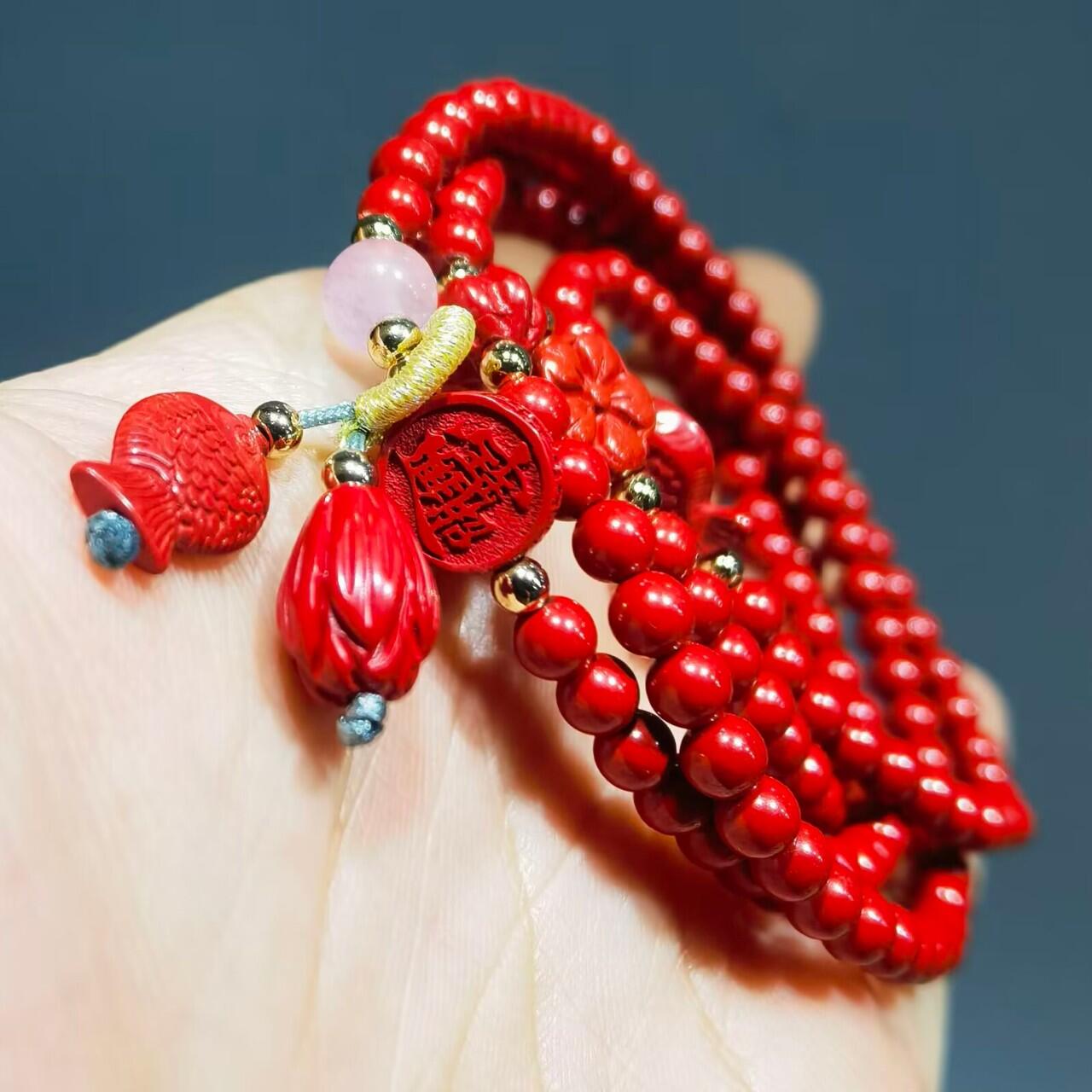 超高含量朱砂原矿帝王砂佛珠手串女款颗颗精选原矿帝王砂0.4cm红砂搭配年年有余、招财进宝平安扣，莲花等配饰，隔珠为14K金！可绕手腕四圈！清新素雅温婉简约！
克重：29.3
