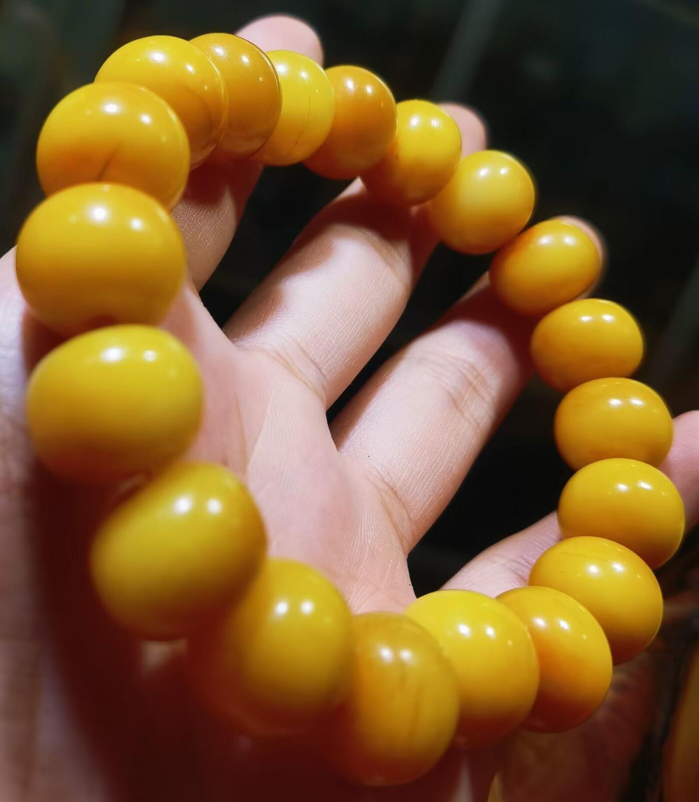 揉骨如玉抹香耳骨男款佛珠手串，已包浆，尺寸:14mm*11mm