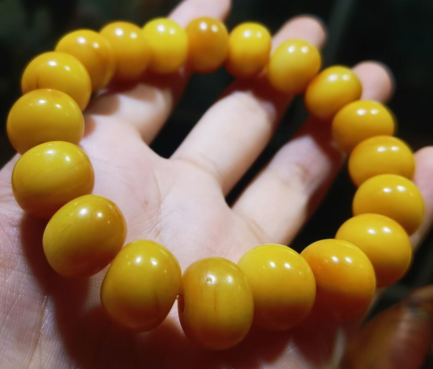 揉骨如玉抹香耳骨男款佛珠手串，已包浆，尺寸:14mm*11mm