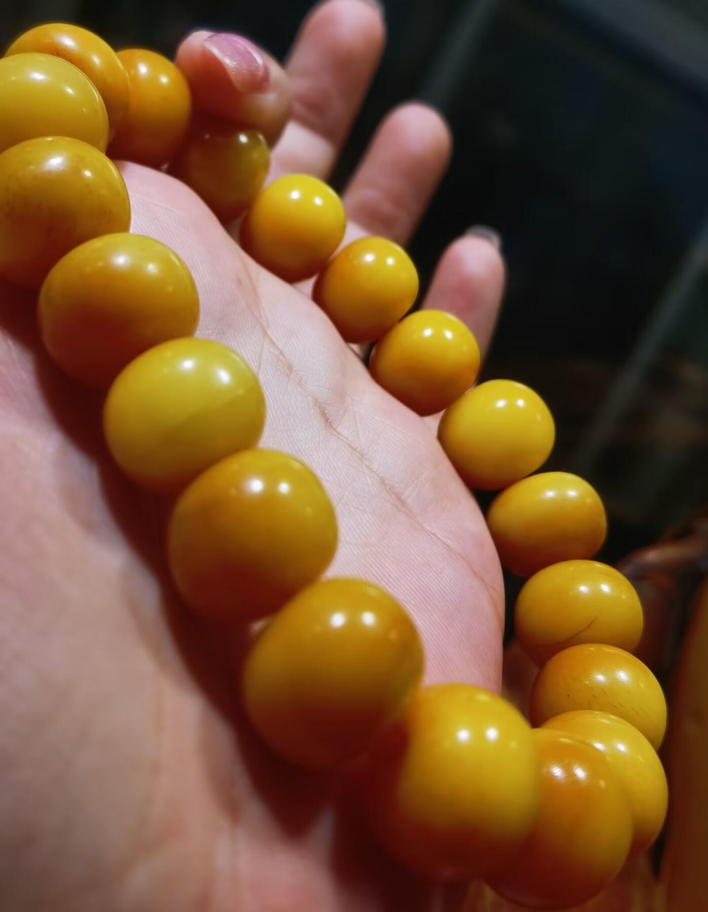 揉骨如玉抹香耳骨男款佛珠手串，已包浆，尺寸:14mm*11mm