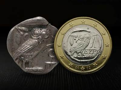 希腊钱币为钟爱欢猫头鹰图案