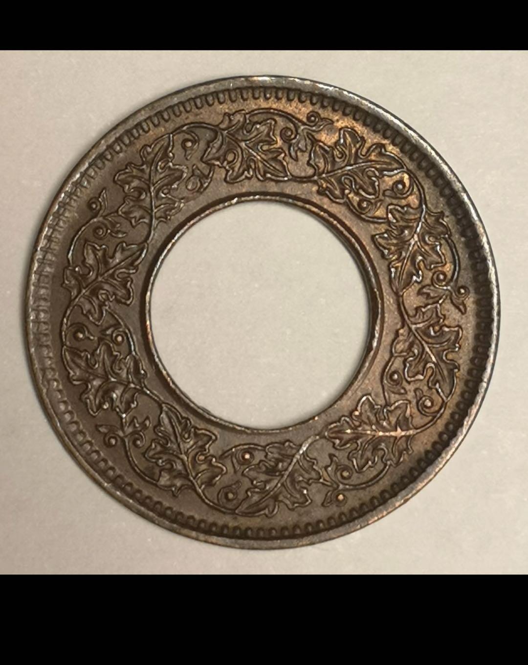 英属印度的中孔机制币