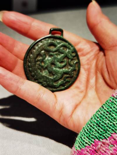 西辽狩猎图背单龙挂花钱