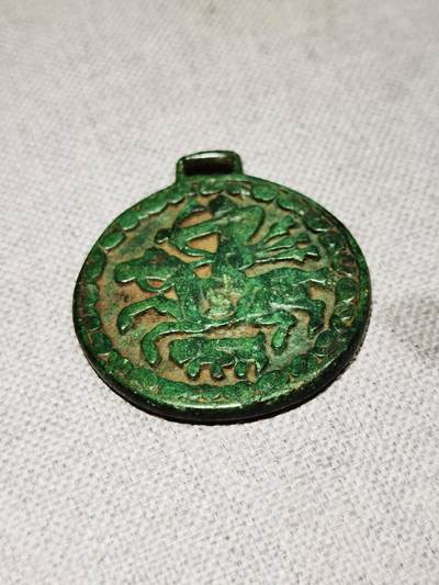 西辽狩猎图背单龙挂花钱