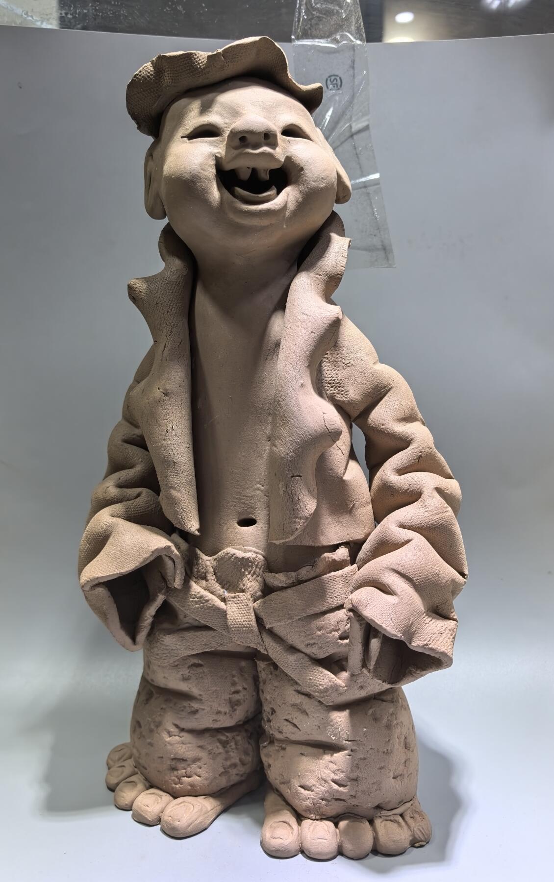 北京宋庄王瑞清大师纯手工创作紫砂福娃摆件，工艺精湛，喜庆活泼，福气常伴。
高34cm*16cm*8cm