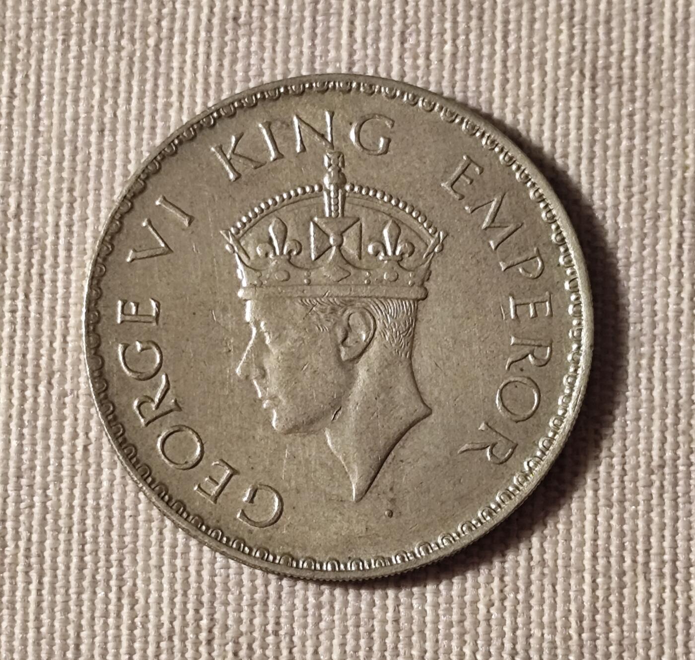 1940年减银版战时一卢比银币与口吃国王的战时担当