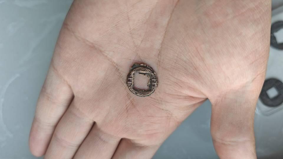 所见最小能看清文字的半两