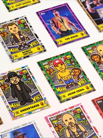 Topps联手潮牌BAPE为WWE明星们制作了特别版本的收藏卡，并以标志性的卡通风格打造人物形象