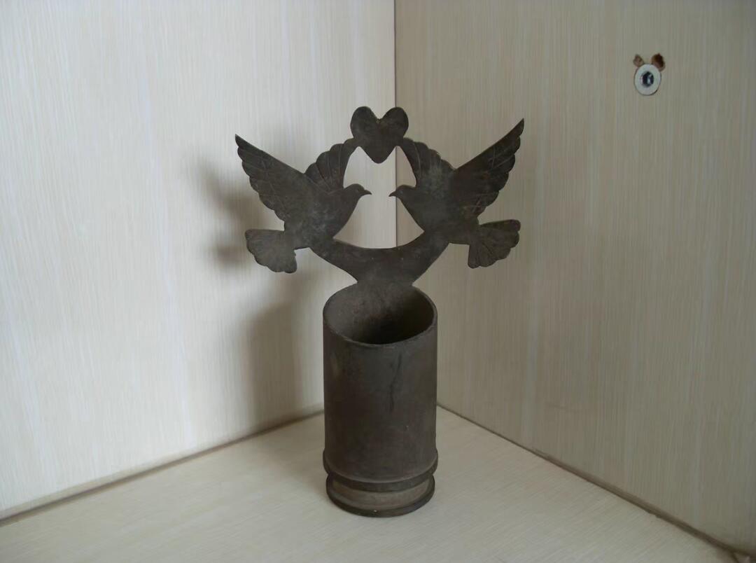 铜炮弹皮摆件，比翼双飞造型！！