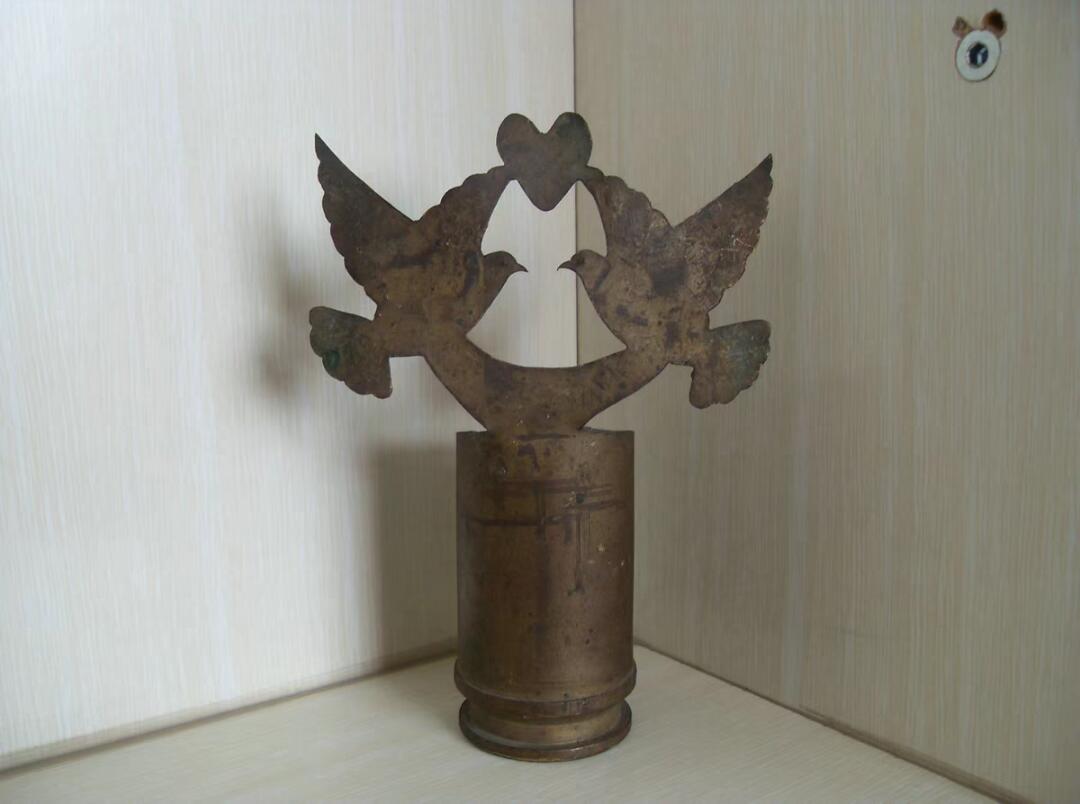 铜炮弹皮摆件，比翼双飞造型！！