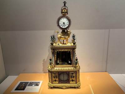 清铜镀金仙猿献寿麒麟驮钟