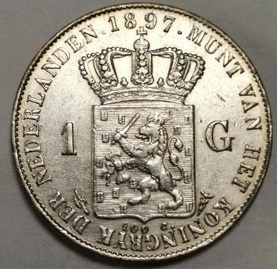 这是一枚1897年荷兰1盾银币（Wilhelmina 少年头像版）✨