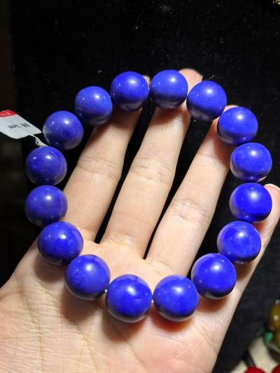 5A级青金石手串佛珠男款，无金无白点，甄选宝石级阿富汗青金石，色泽幽邃湛蓝，晶体温润古朴，上手自带沉稳贵气，杂质少，品质上乘。尺寸：1.4cm