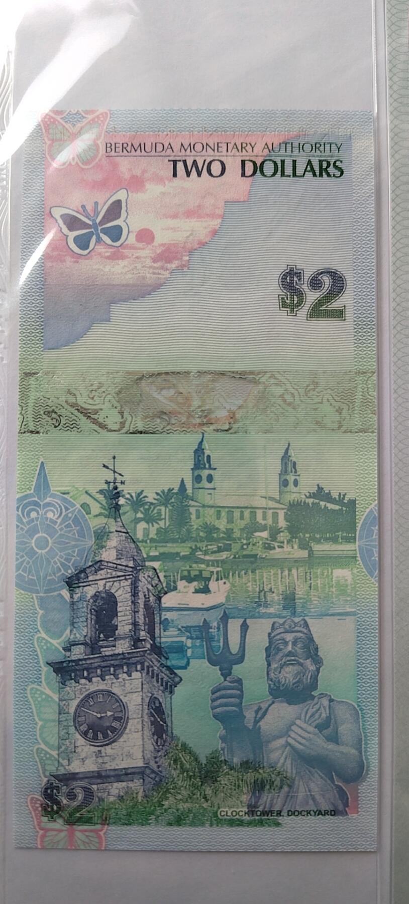 正面：蓝鸟 Bluebird（拉丁名：Sialia）
背面：百慕大皇家海军船舶修造厂及其钟塔，