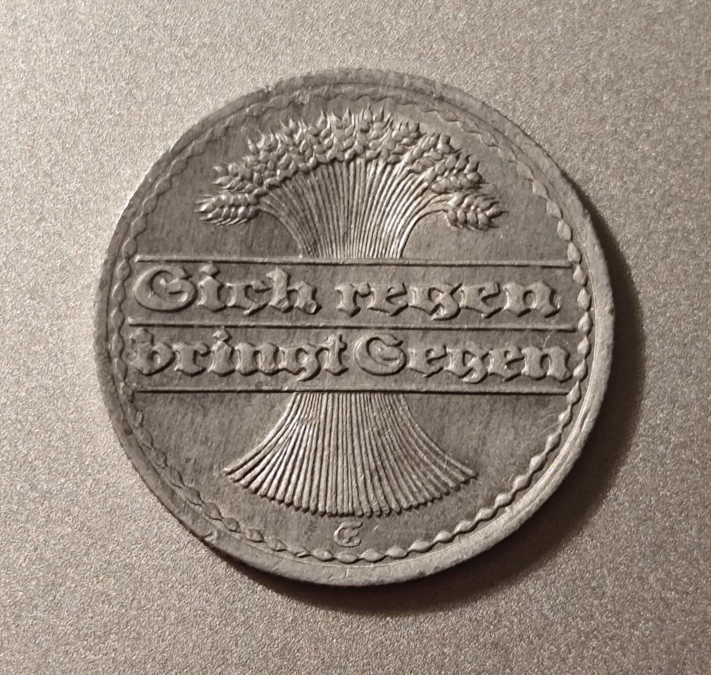 魏玛共和国时期（1921年）德国50芬尼铝币和50万马克一条的面包