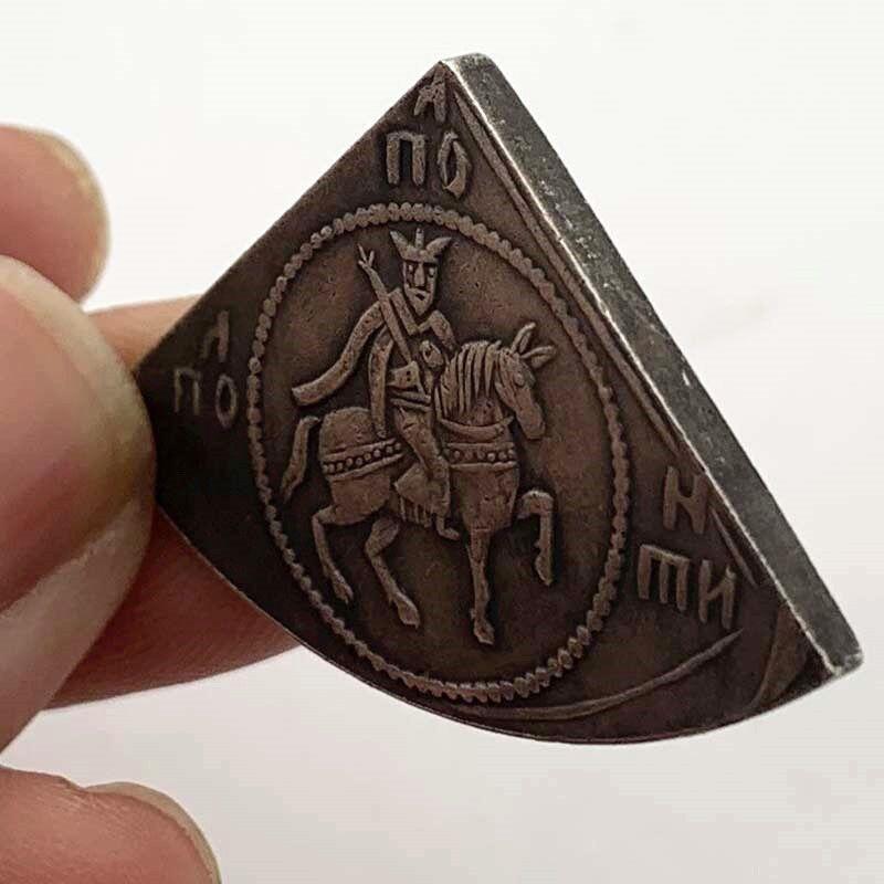 佩罗斯银质三角形古硬币