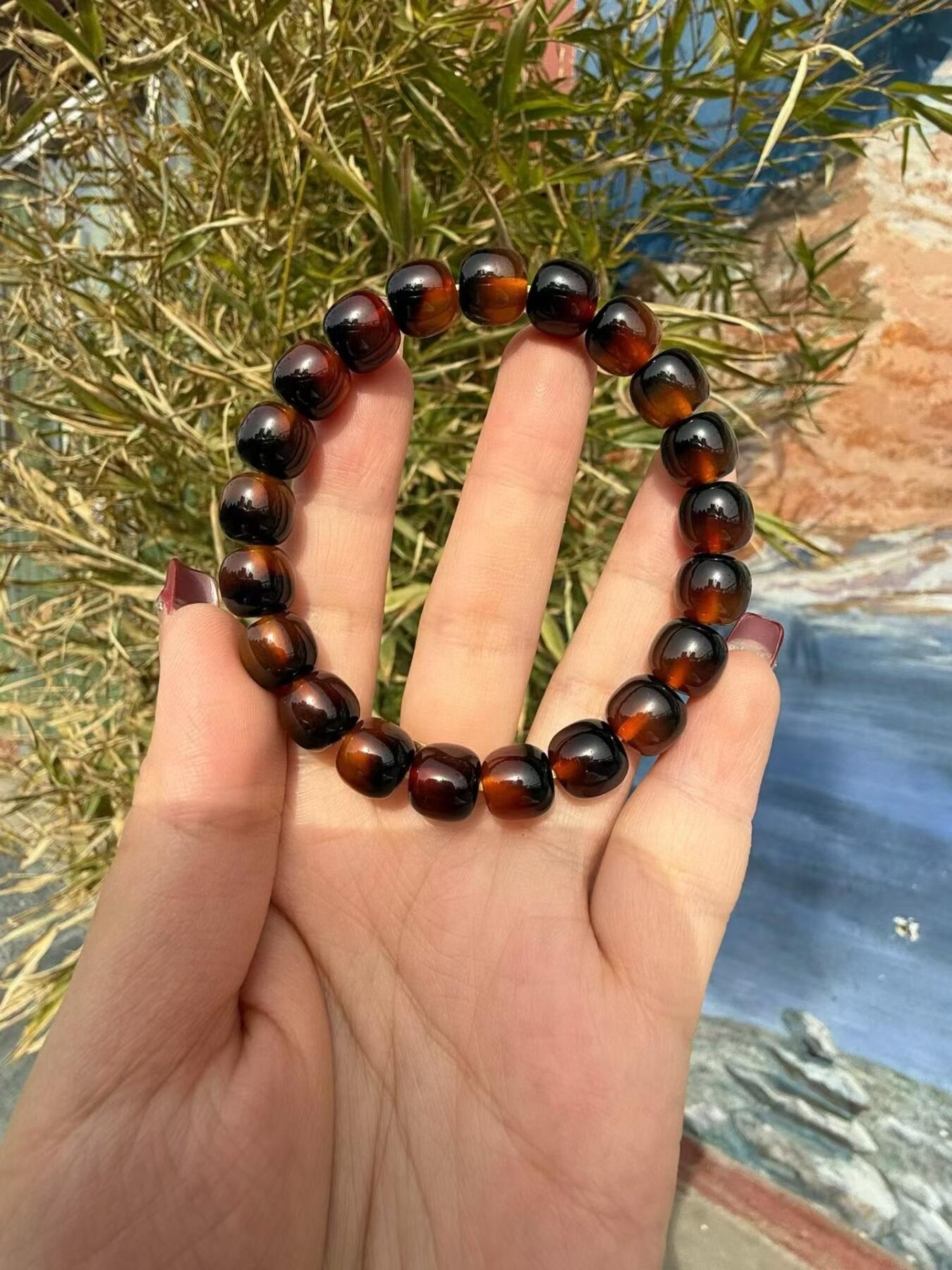 纯天然海底软黄金十三麟佛珠手串，男女款，尺寸10x10mm。珠体油润，纹理自然，颜色漂亮，盘玩收藏皆宜。实物实拍，所见即所得。