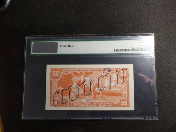 "鲸贝乐淘"第黄号拍卖十件 1957年老挝50元样币，评级64NET 