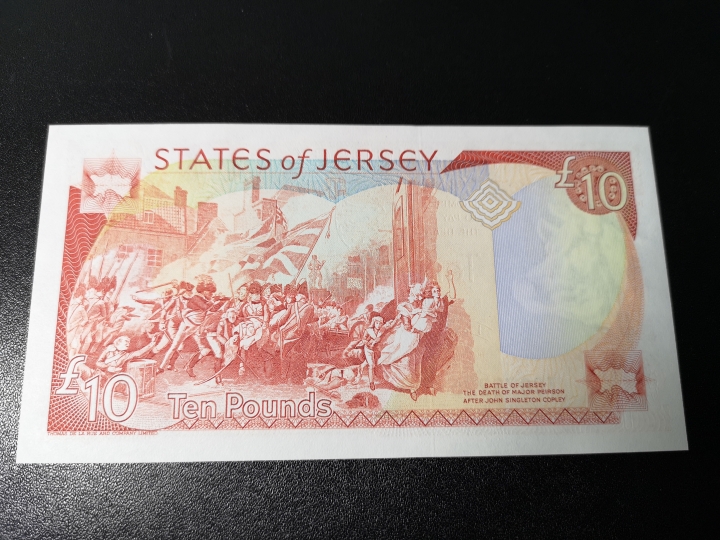 《外钞收藏家》第五十八期拍卖 泽西10镑 背面非常精美的一张  全新unc