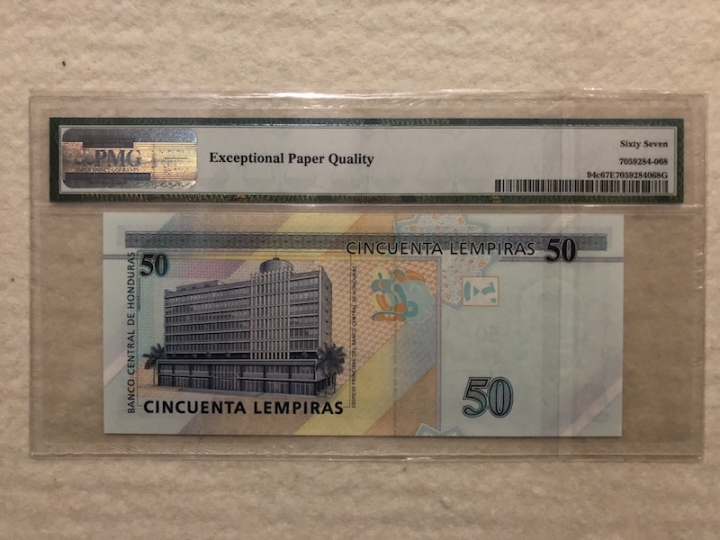 收藏联盟第六十六期拍卖 洪都拉斯1050 PMG67E 唯一冠军分