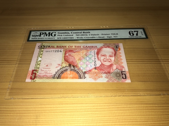 收藏联盟第六十七期拍卖 冈比亚135 PMG67E