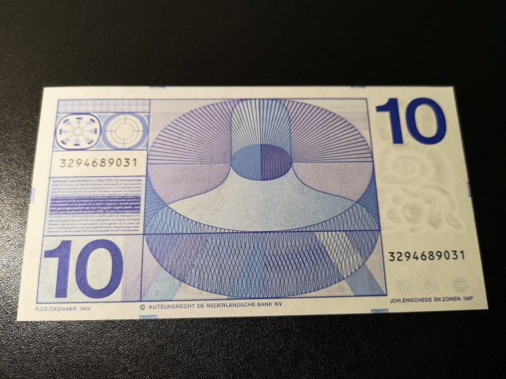 《外钞收藏家》第五十九期拍卖 荷兰人像版10盾  全新unc