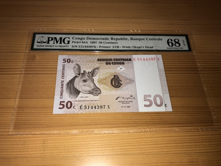 收藏联盟第六十七期拍卖 民主刚果9750 PG68E 冠军分