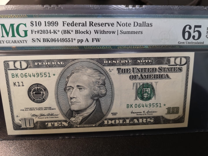 《外钞收藏家》第五十九期拍卖 1999年大头10美元  补号 pmg65