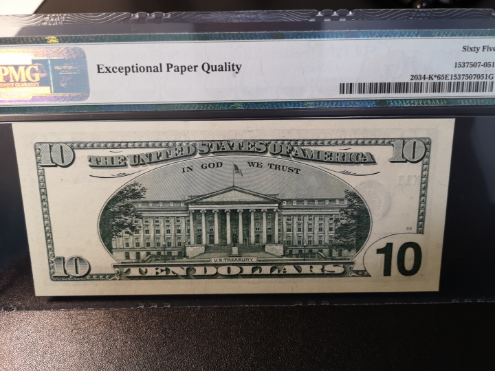 《外钞收藏家》第五十九期拍卖 1999年大头10美元  补号 pmg65