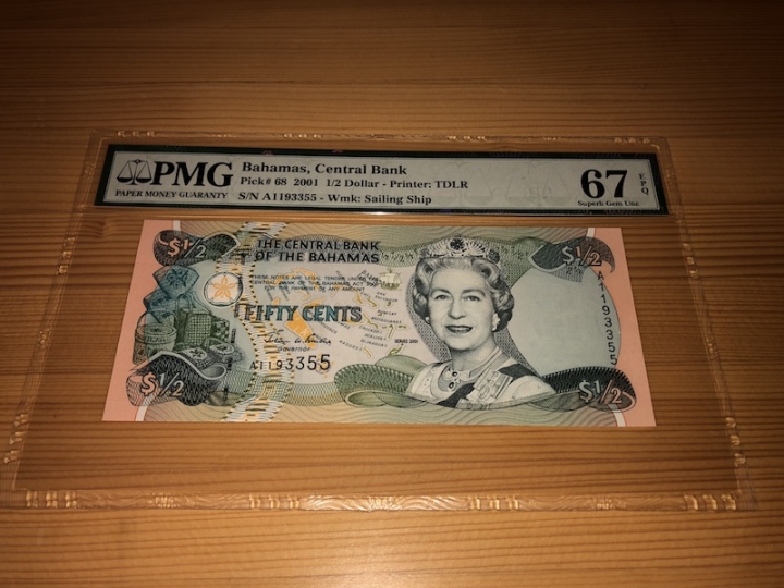收藏联盟第六十八期拍卖 巴哈马01.5 首发冠PMG67E