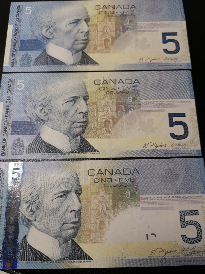 外钞收藏家第六十期拍卖 加拿大旅版5元 三张 au品相 